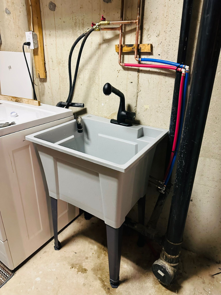 Laundry Room Sink Installation in Anjou - Delta Plumbers